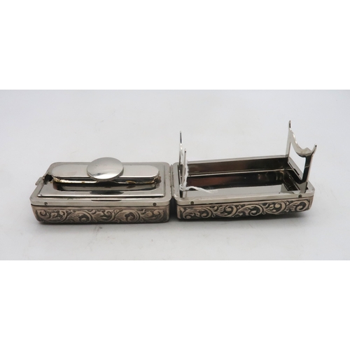 272 - An Edwardian silver travelling curling tong warmer, the body with embossed scrolling foliate decorat... 