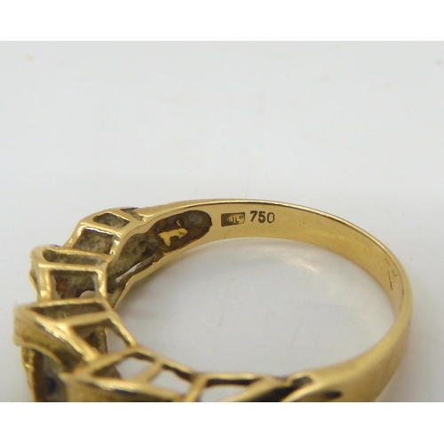 479 - An 18ct gold knot pattern ring, size Q, weight 4.7gms