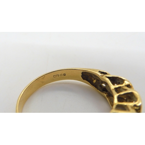 479 - An 18ct gold knot pattern ring, size Q, weight 4.7gms