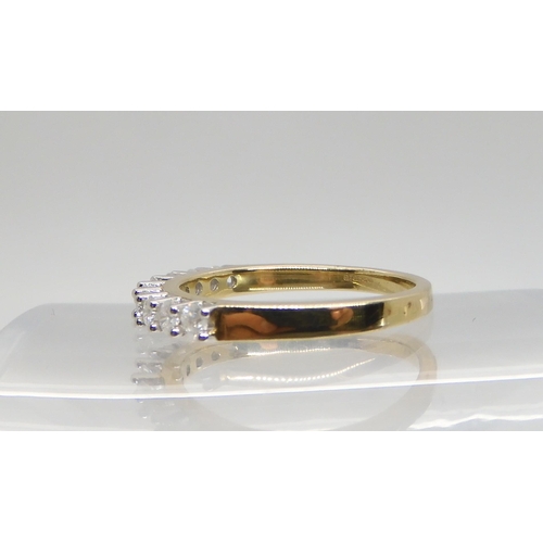 484 - A 9ct gold diamond eternity ring, set with estimated approx 0.40cts of brilliant cut diamonds, finge... 