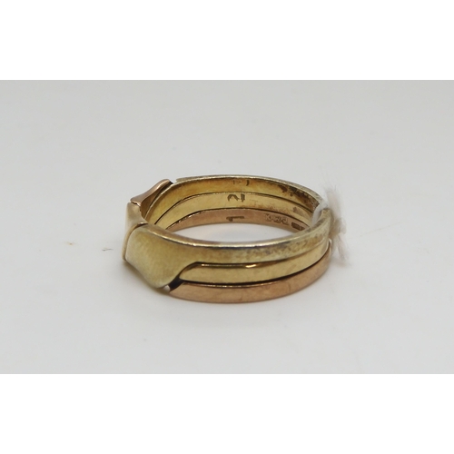 488 - A 9ct gold three colour gold puzzle ring, size P1/2, together with a 9ct abstract ring size Q1/2, we... 