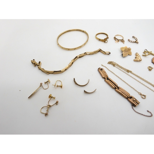 507 - A collection of 9ct gold items to include a bangle, a coin mount, watch straps etc, weight all toget... 