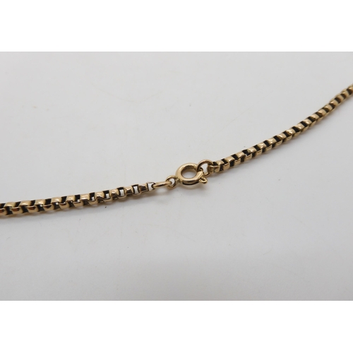 508 - A 9ct gold curling medallion on a vintage 9ct chain, length 46cm, weight together 18gms