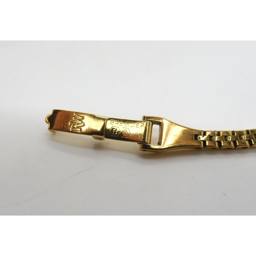 512 - A 9ct gold three colour gold bracelet, length 18cm, weight 6.4gms, and a Raymond Weil gold plated la... 