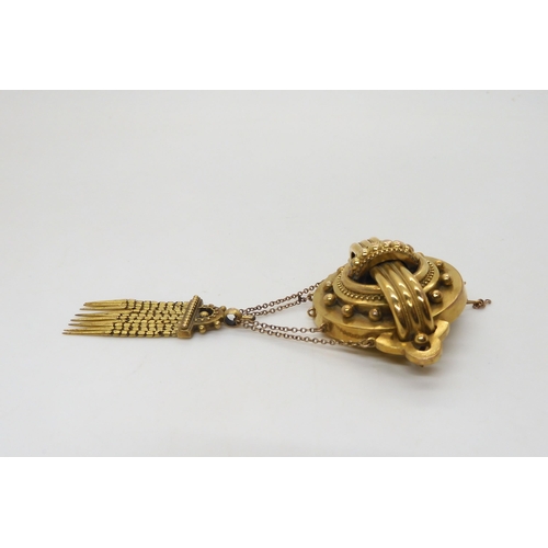 521 - A Victorian yellow metal brooch, length with tassel 9cm, weight 16.5gms