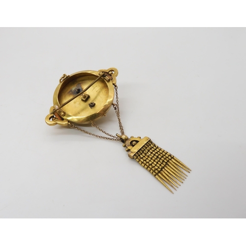 521 - A Victorian yellow metal brooch, length with tassel 9cm, weight 16.5gms