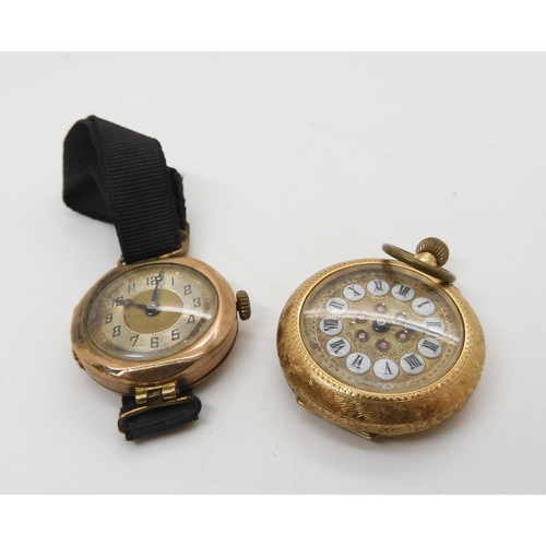 535 - A 14k gold ladies fob watch, with enamelled numerals and gem set dial, diameter 3cm, weight includin... 