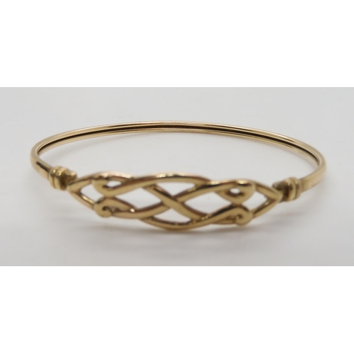 541 - A 9ct gold knotwork bangle together with two pairs of earrings weight together 8.2gms