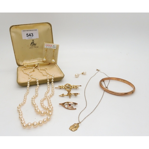 543 - A double string of Ciro faux pearls in original box with a 9ct clasp, a 9ct bangle, a Lincoln imp br... 