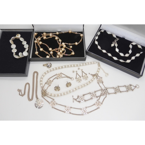 564 - A suite of silver Celtic Cross jewellery made by John Prince, with further cultured pearl statement ... 