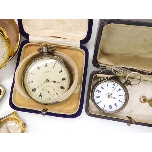 565 - A silver pocket watch hallmarked Birmingham 1913, a continental silver fob watch, two retro Gents wr... 