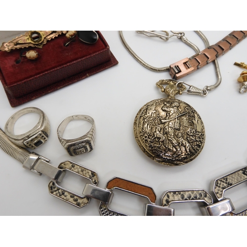 573 - A white metal vintage fob chain, pocket watch, a pair of silver mounted cameo earrings and other ite... 