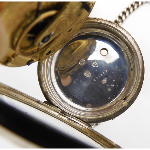 577 - A silver open face pocket watch with a decorative silver dial, and silver fob chain, diameter of the... 