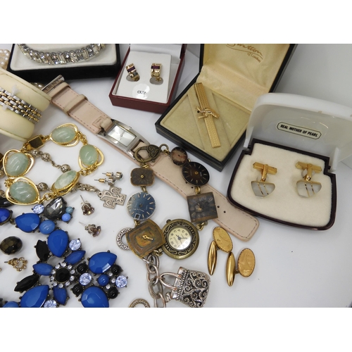 578 - A collection of Vintage costume jewellery, to include cufflinks, a bowling tie clip and other items