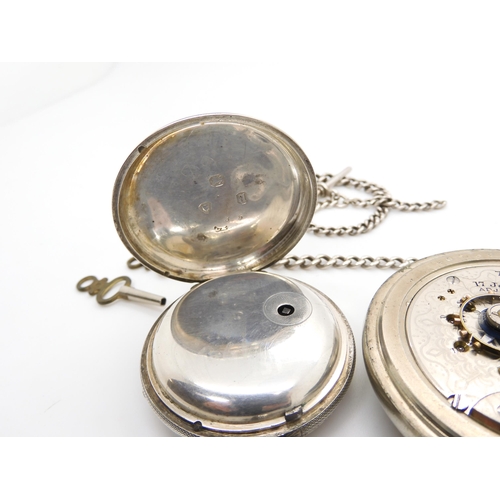 583 - A silver open face pocket watch, diameter 4.5cm, hallmarked London 1916, together with a 'Silveroid'... 