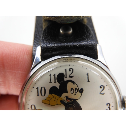 585 - Two 9ct cased gents watches one by Waltham, weight including straps and mechanisms 66.5gms, together... 