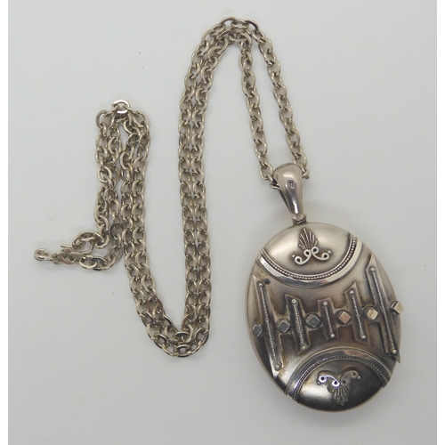 586 - A silver Edwardian locket hallmarked Birmingham 1920 Ward Brothers length with bail 6.8cm x 4cm, cha... 