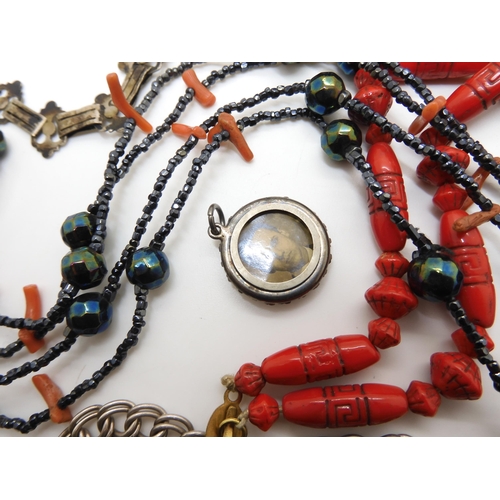 604 - Two silver bangles, a Max Neiger red glass bead necklace, a Chinese silver buckle, and other items