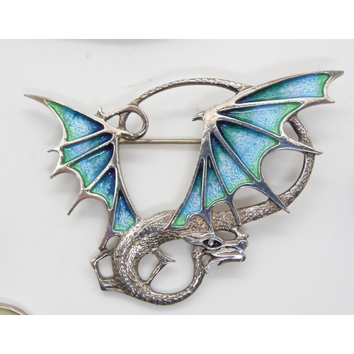 606 - A pair of silver Ortak Maeshowe dragon earrings, a further silver and enamel dragon brooch, a David ... 