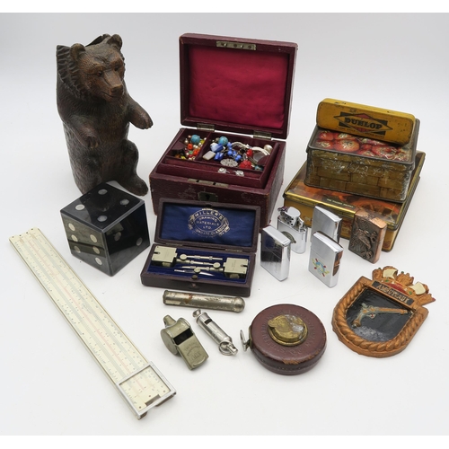 354 - An eclectic mixed lot, comprising Black Forest-style bear taper holder, 33ft leather-cased tape meas... 