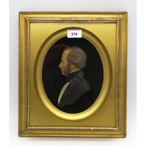 379 - A large Victorian wax portrait of a gentleman in profile, in gilt frame, measuring approx. 36cm x 31... 