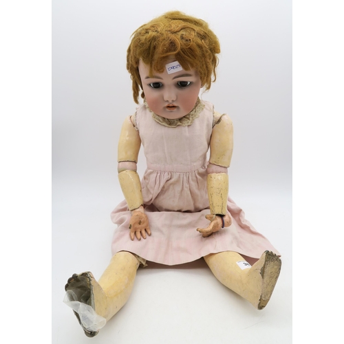 387 - A large doll with articulated limbs and blinking eyes, the head stamped 