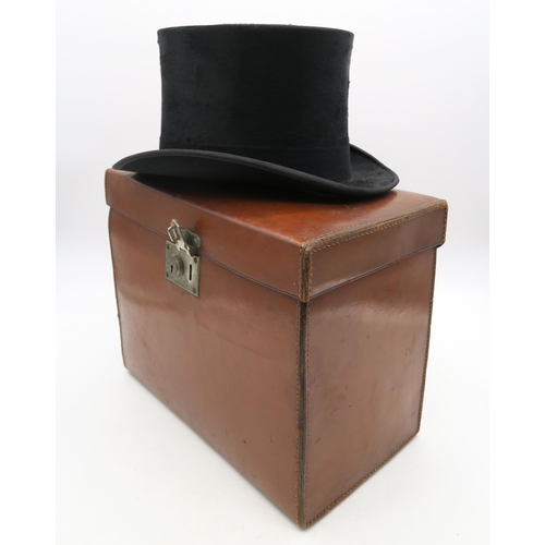 394 - A silk top hat, generous size, by R.W. Forsyth, Glasgow, contained in a tan leather velvet-lined fit... 