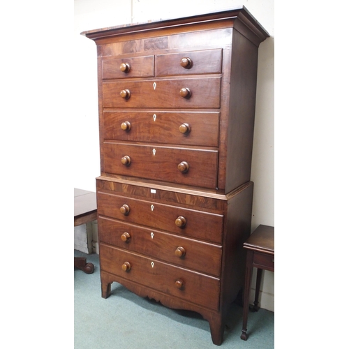 55 - A Victorian mahogany chest on chest with moulded cornice over two short over three long drawers on t... 