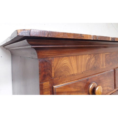 55 - A Victorian mahogany chest on chest with moulded cornice over two short over three long drawers on t... 