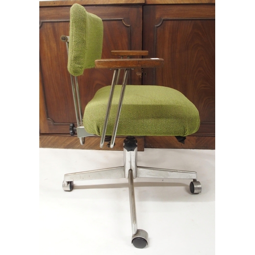 80 - A mid 20th century Norsteel swivel desk chair with green upholstered adjustable back rest and seat o... 