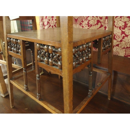 91 - A late 19th/early 20th century two tier side table in the manner of Liberty & Co with Mushavabie... 