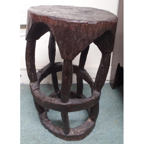 94 - A lot comprising an east African hardwood chair with high back over carved seat and support, 115cm h... 