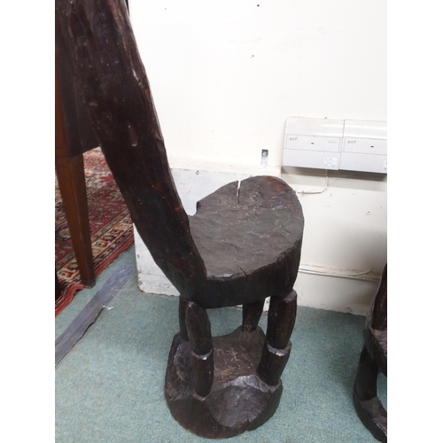 94 - A lot comprising an east African hardwood chair with high back over carved seat and support, 115cm h... 