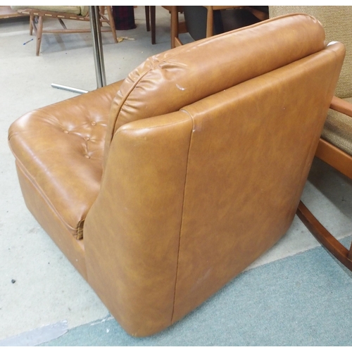 96 - A 20th century brown buttoned upholstered lounge chair, 82cm high x 70cm wide x 80cm deep