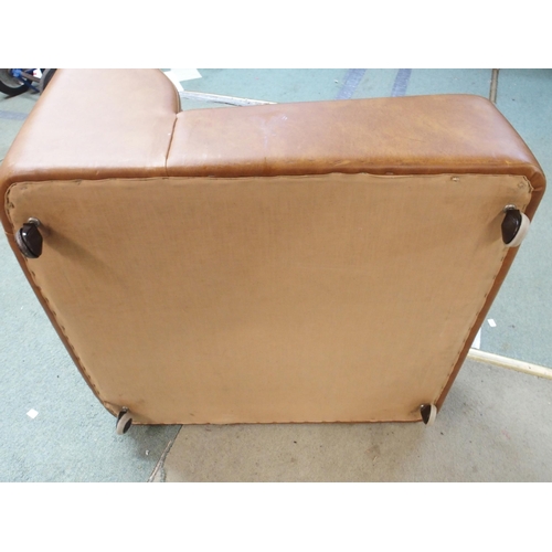 96 - A 20th century brown buttoned upholstered lounge chair, 82cm high x 70cm wide x 80cm deep