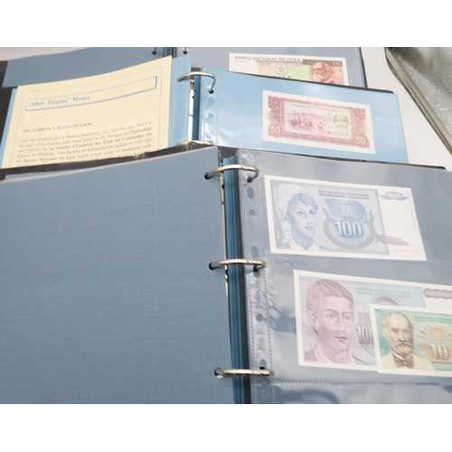 308 - BANK NOTES an extensive collection of uncirculated worldwide bank notes in four presentation folders... 