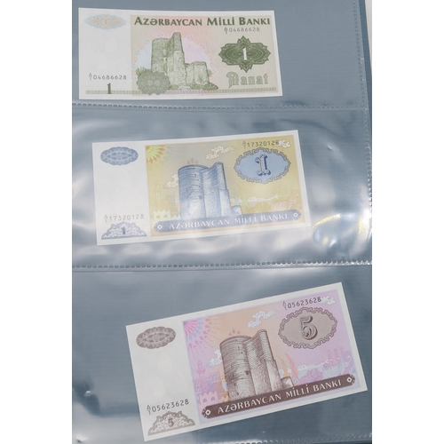 308 - BANK NOTES an extensive collection of uncirculated worldwide bank notes in four presentation folders... 