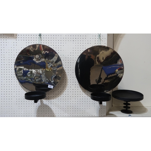 163 - A pair of chrome and black metal wall sconces, together with a Robert Welch cast iron Hobart tazza