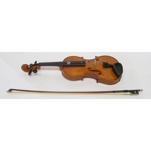 327 - A two piece back violin by Stentor Romania with a bow and case, strings etc