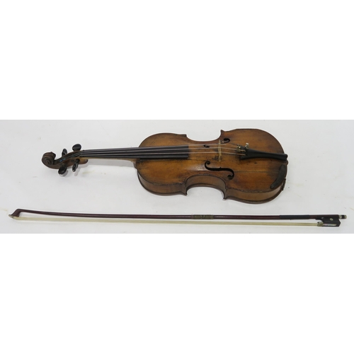 328 - A 19th century two piece back violin 35cm with a bow and wood case