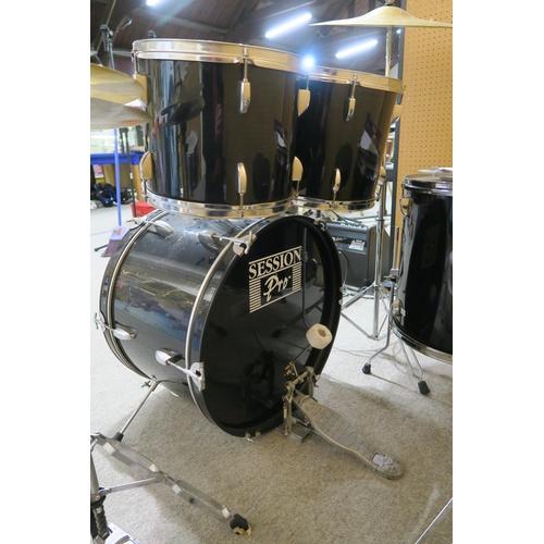 331 - A Session Pro five piece drumkit together with four sets of drumsticks and various self learning pub... 