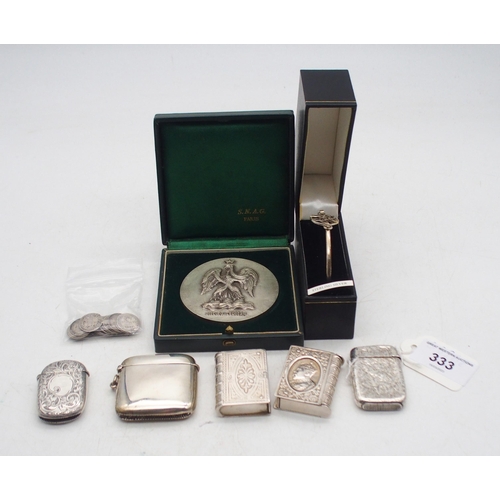 333 - A collection of silver including a Victorian silver vesta, by John Thompson & Sons, with embosse... 