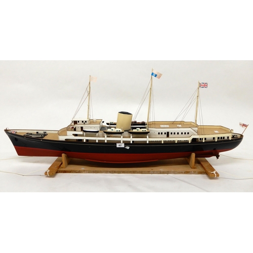 467 - A model ship in the manner of The Royal Yacht Britannia on stand, 54cm high x 130cm long x 20cm deep... 