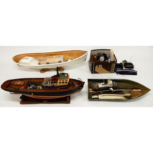 469 - A mixed lot to include scratch built model of a fishing trawler and assorted unbuilt model ship hull... 