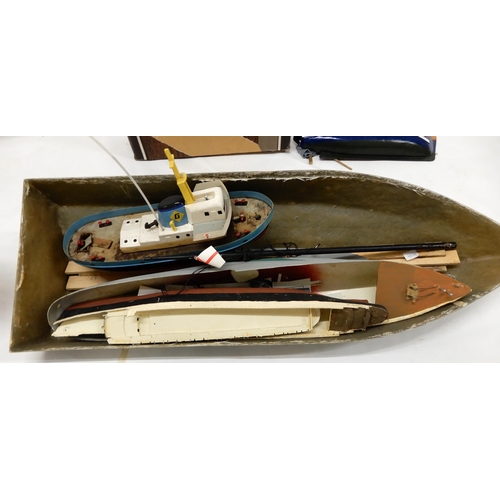 469 - A mixed lot to include scratch built model of a fishing trawler and assorted unbuilt model ship hull... 