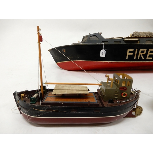 473 - A lot of three assorted model boats, fire rescue craft fitted with petrol motor, 118cm long (46.5