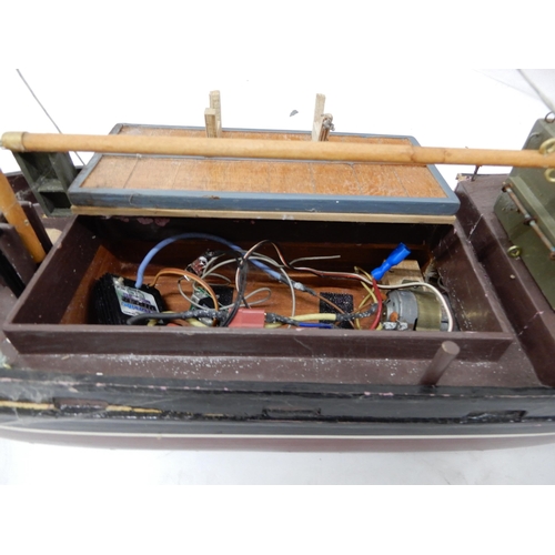 473 - A lot of three assorted model boats, fire rescue craft fitted with petrol motor, 118cm long (46.5