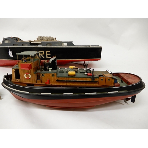 473 - A lot of three assorted model boats, fire rescue craft fitted with petrol motor, 118cm long (46.5