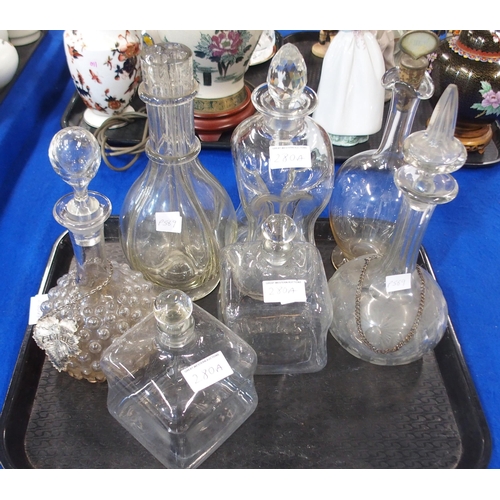 280A - Seven 19th century glass decanters and two labels (7)