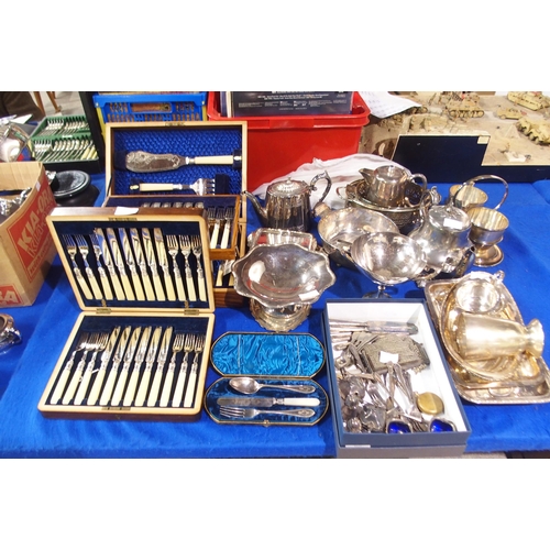 334A - A large collection of EPNS including cased fish knives and forks, tazzas, loose cutlery, hotelware e... 